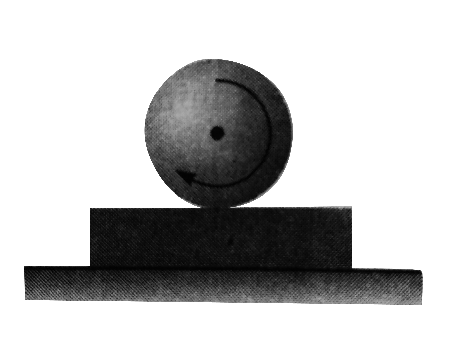 A horizontal plank having mass m lies on a smooth horizontal surface. A sphere of same mass and radius r is spined to angular frequency omega(0) and gently placed on the plank as shown in the figure. If coefficient of friction between the plank and the sphere is mu. Find the distance moved by the plank till sphere starts pure rolling on the plank. the plank is long enough.