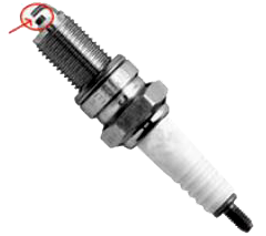 A spark plug in a bike or a car is used to ignite the air-fuel mixture in the engine. It consists of two electrodes separated by a gap of around 0.6 mm gap as shown in the figure.      To create the spark, an electric field of magnitude 3 xx 10^6