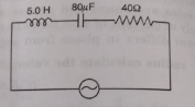 The given circuit diagram shows a series LCR circuit connected to a variable frequency 230 V source.  Obtain the impedacne of the circuit and the amplitude of current at resonating frequency.